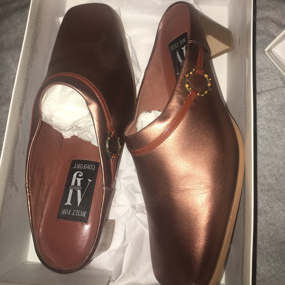 Bronze slides. 10 wide