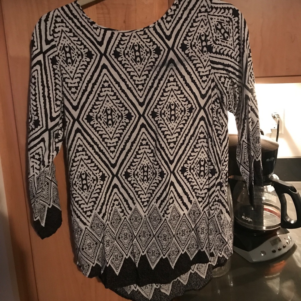 Three quarter length shirt.