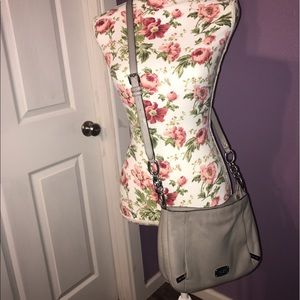 A beautiful pearl color MK purse.