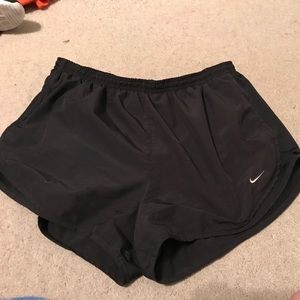 All black nike shorts.