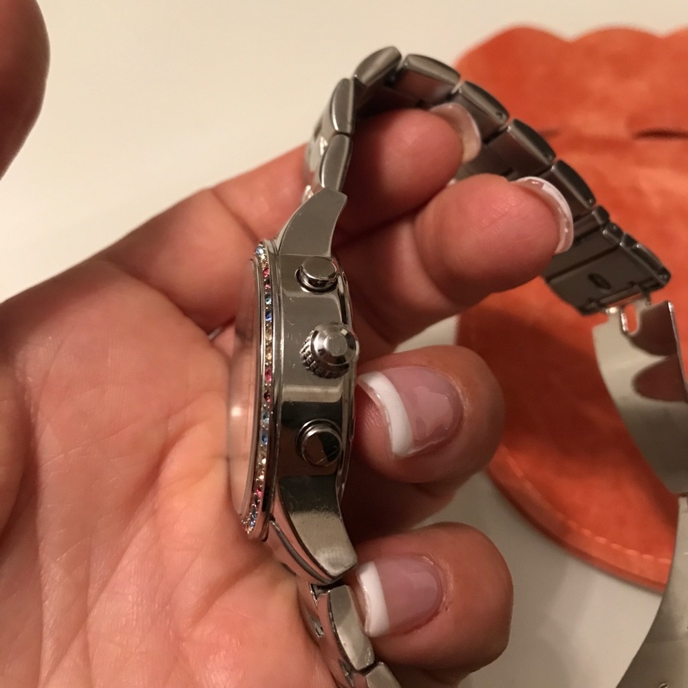 DKNY watch with multi colored crystals on face. - Picture 5 of 8