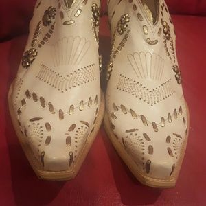 Vintage BCBG and gold short cowboy boots.