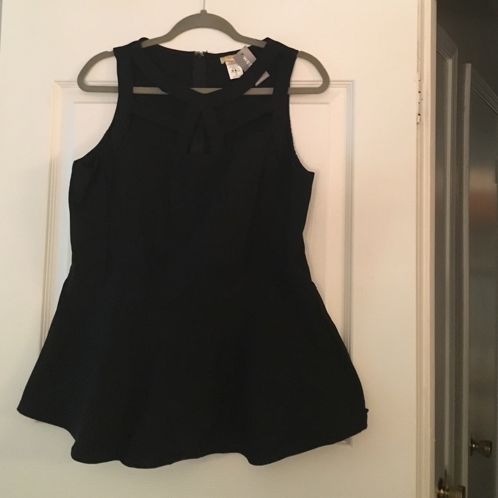 Wet seal peplum tank with cut out detail at chest