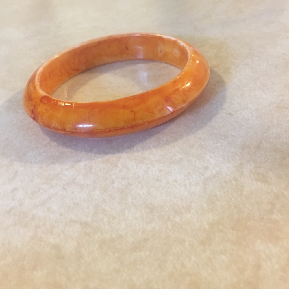 Single orange bangle