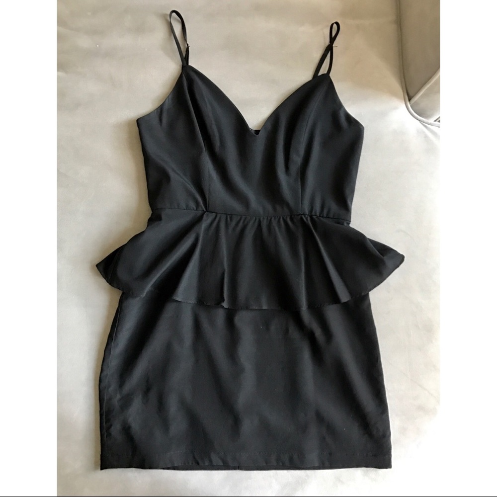 Black mini dress with peplum waist