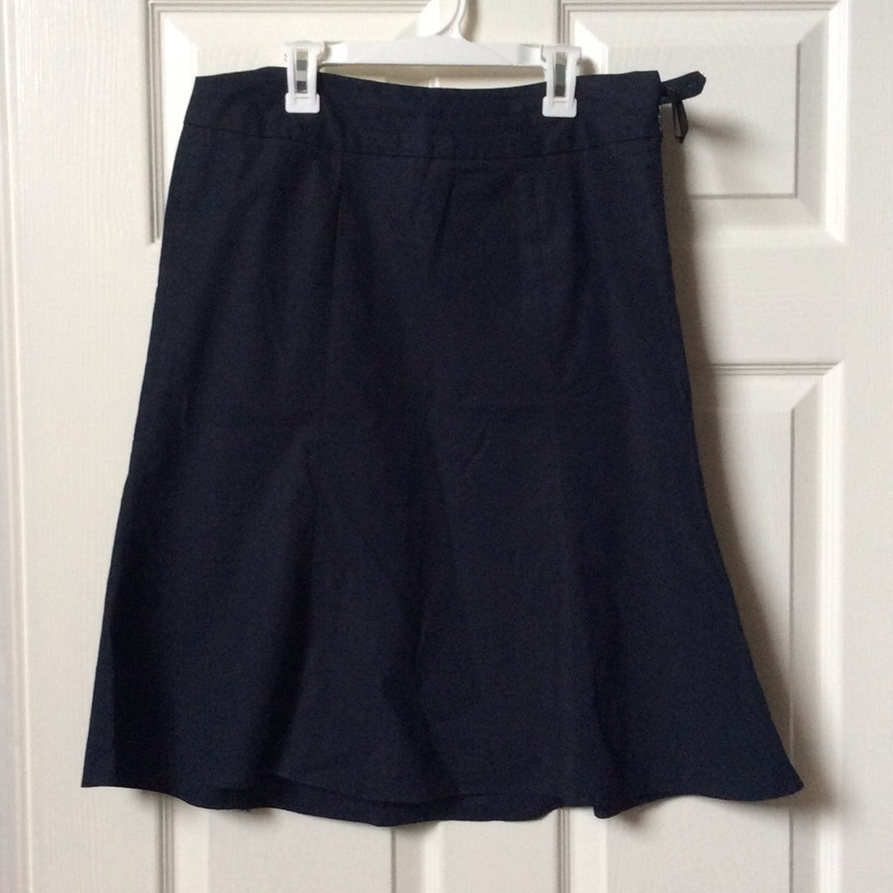 A line skirt with a zipper on the side runs big