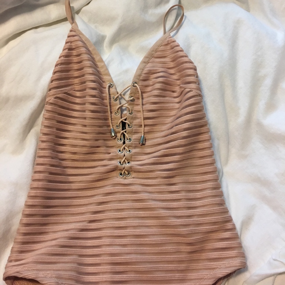 Nude laceup body suit