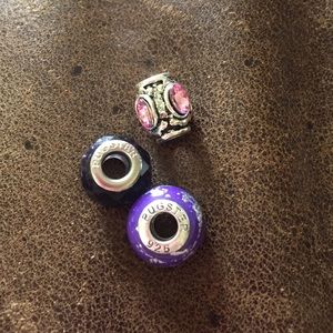 Three pugster charms