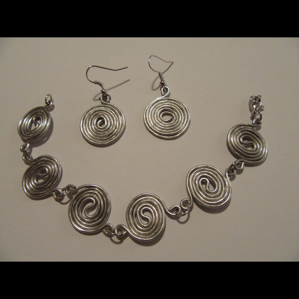 Silver Swirls Earrings and Bracelet set.