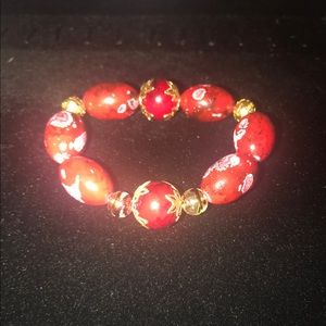 Men's red and gold accented bracelet
