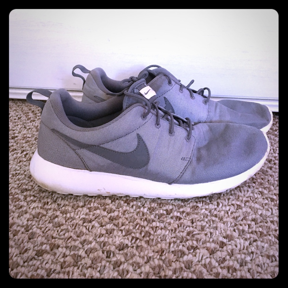 Grey Nike running shoes