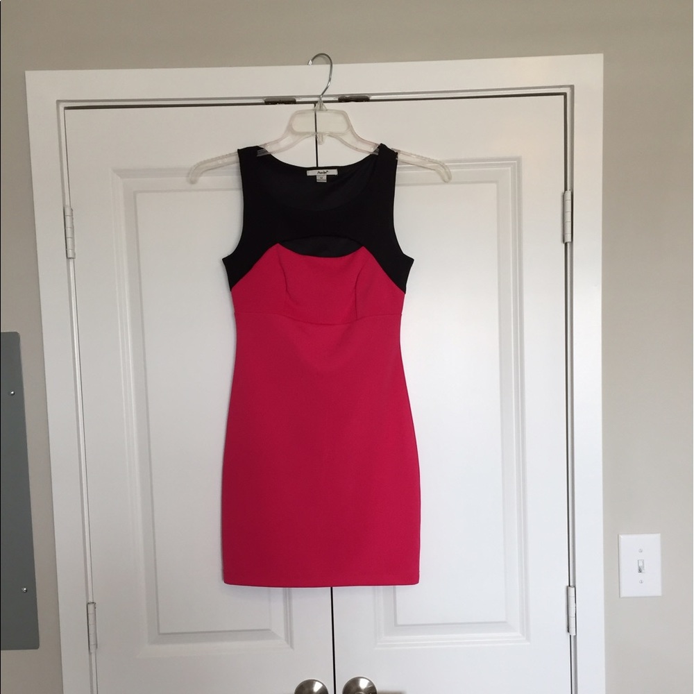Sexy form fitting peekaboo dress