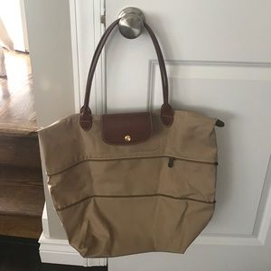 Longchamp large expandable Le Pliage tote in beige