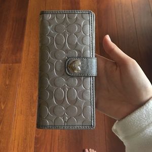 Silver coach wallet