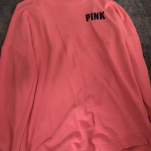 A pink sweat shirt