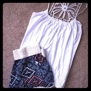 Express darling white tank with crochet back!
