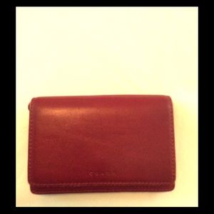 Mini coach wallet.