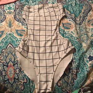 White with navy stripes one piece swimsuit.