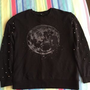 Forever 21 black sleeve-studded sweater.