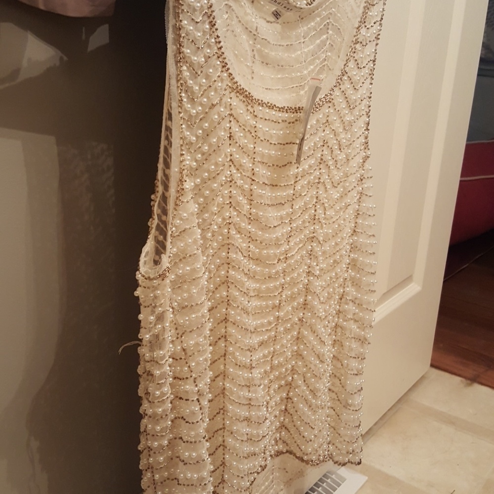 Buckle pearl top