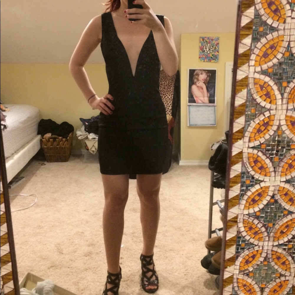Little black dress with plunging neckline
