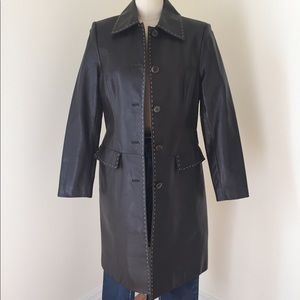 Brown leather coat with tan pick-stitch detail.