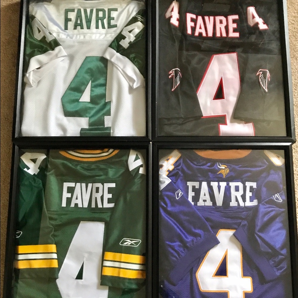 SOLD 4 Authentic Brett Farve jerseys in shadow box
