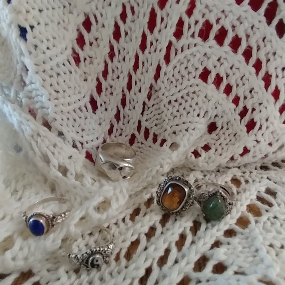 Bundle of sterling silver rings.
