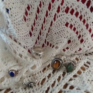 Bundle of sterling silver rings.