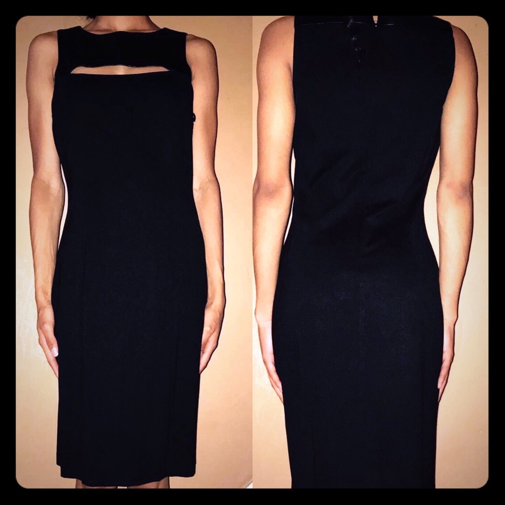 Black slim fitting dress with cut out top