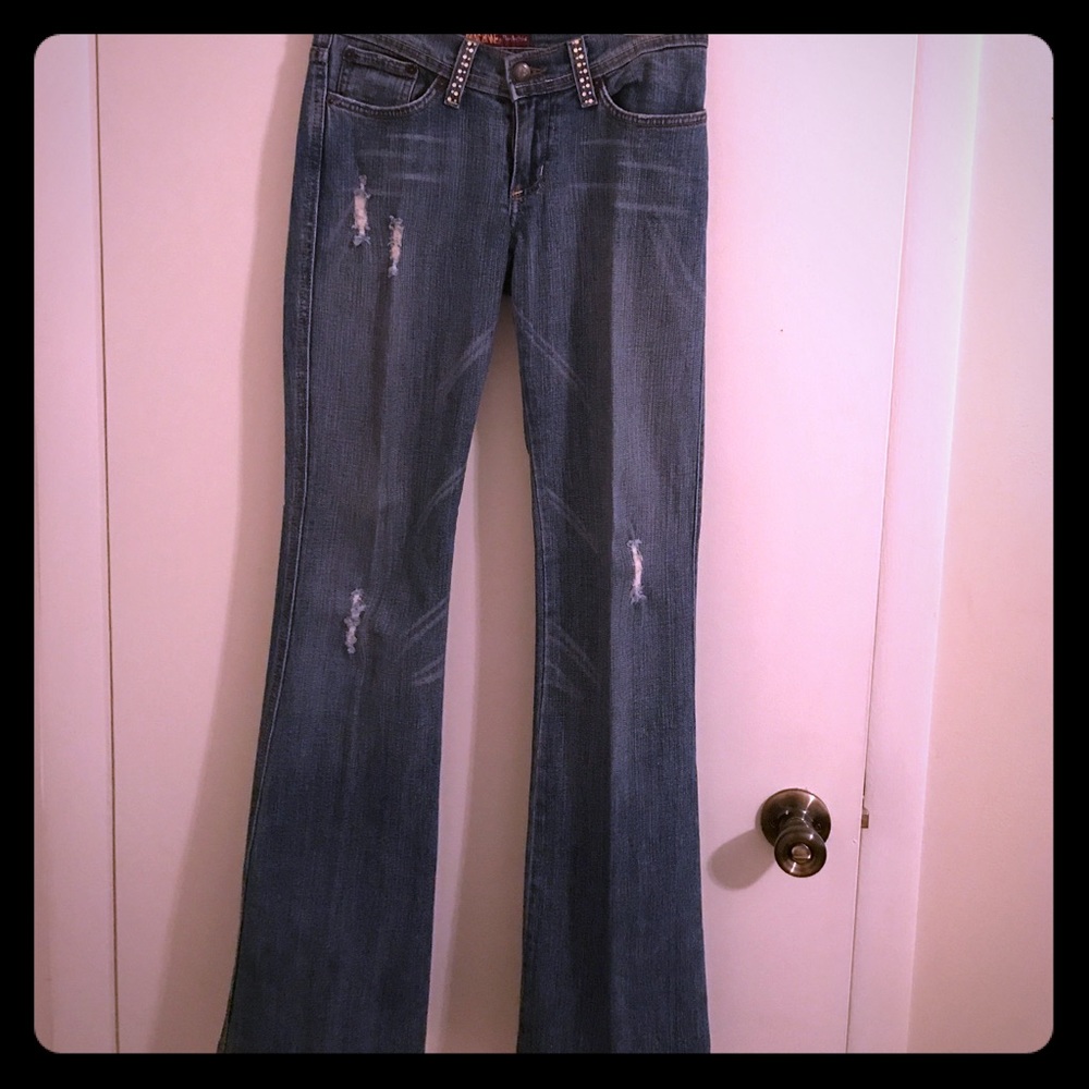 Distressed jeweled pocket bootcut jeans