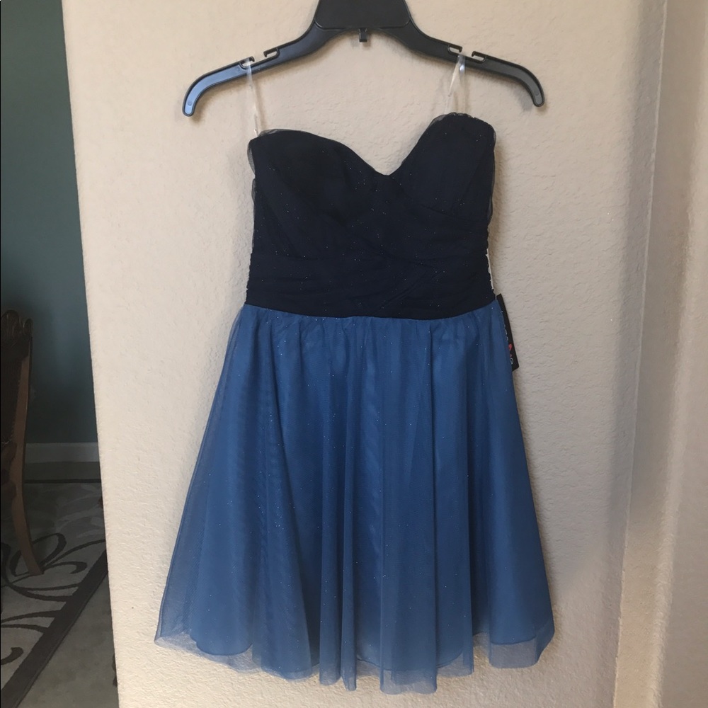 Never worn formal dress with tags on them