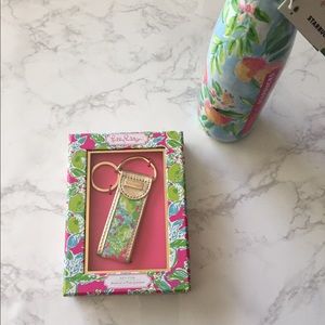Lilly Pulitzer gold tone key fob. NIB