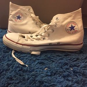 White chuck Taylor's high rise size 9.5/ 11.5