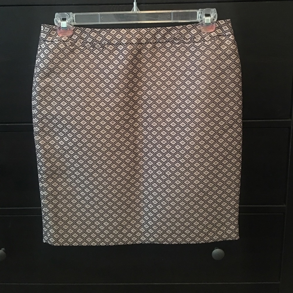 Halogen blush and black skirt