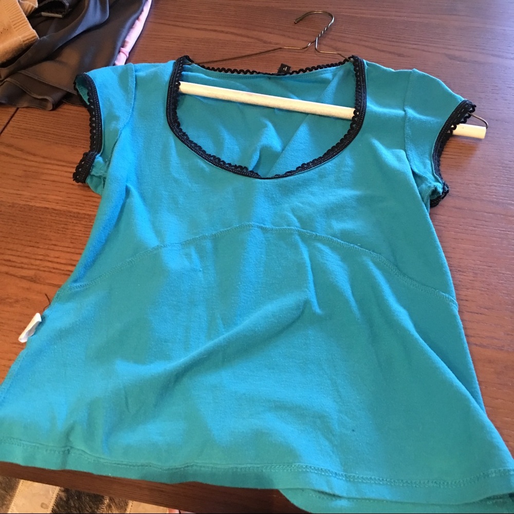 Blue top. With black lace. Size petite