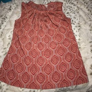 Orange and coral swirled blouse
