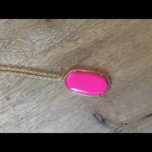 Bright pink Kendra Scott necklace