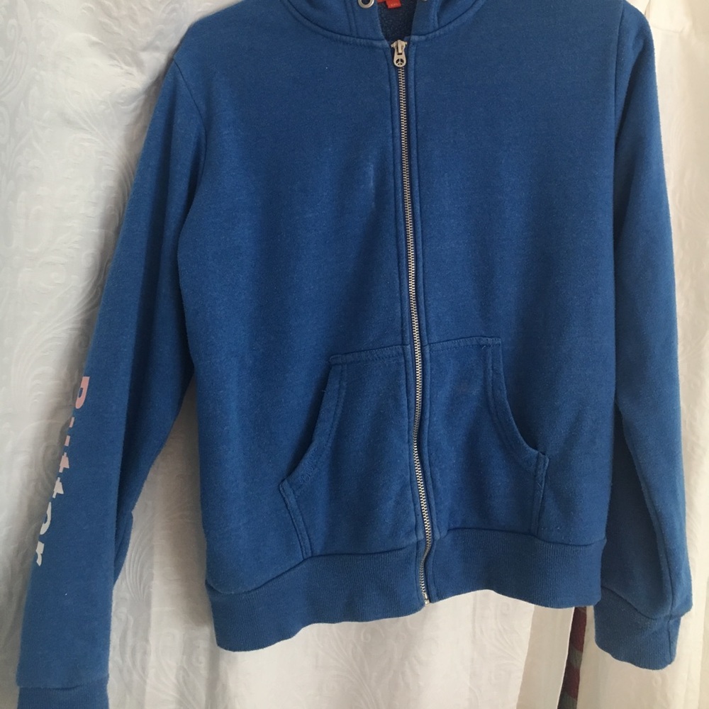 A kids large zip up hoodie