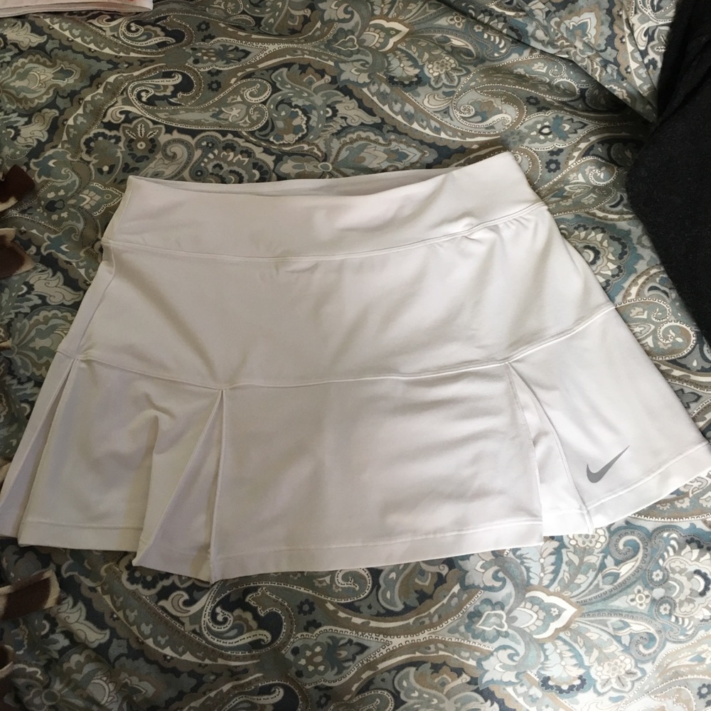 White pleated Nike skirt