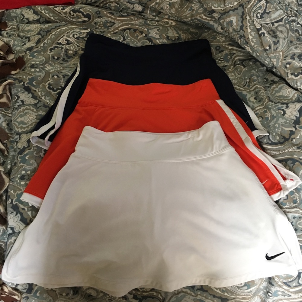 3 Nike Slit skorts (orange, navy, white)