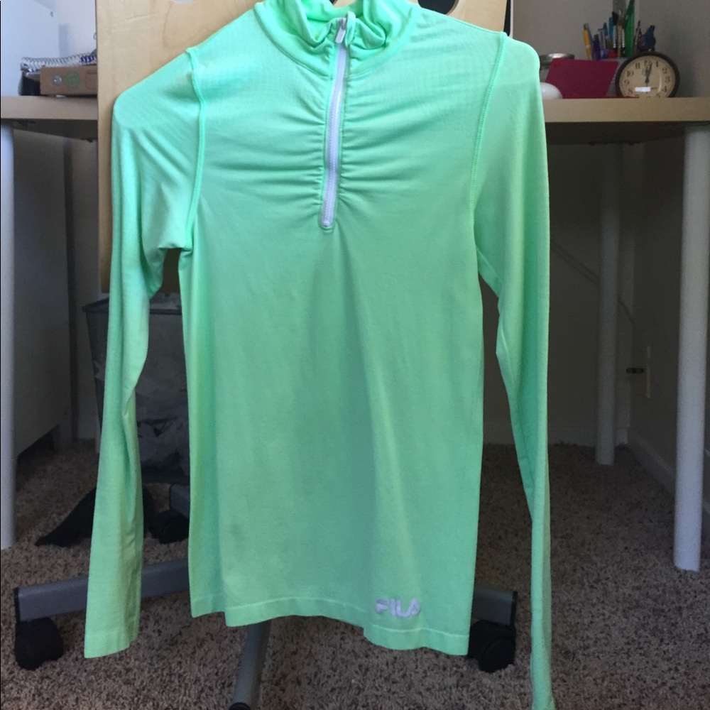 Light green running jacket.