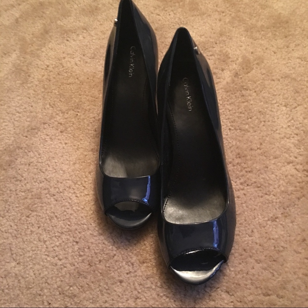CALVIN KLEIN...Blue patent leather peep toes