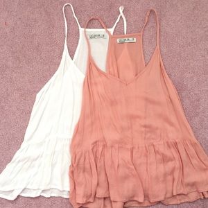 Light colored flowy tank tops