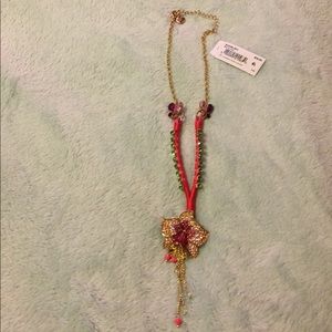 Betseys beautiful flower choker. Gold chain sizes