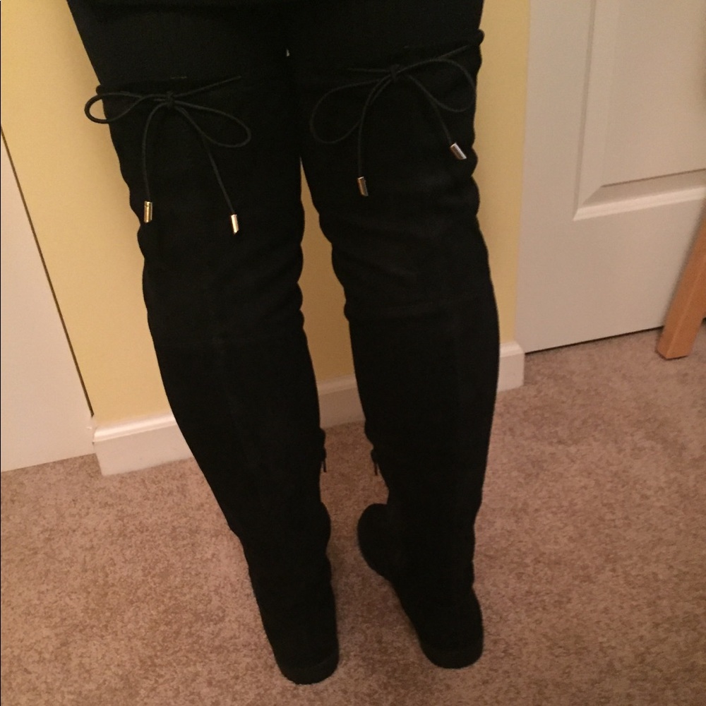 Faux black suede over the knee boots.