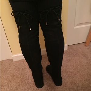 Faux black suede over the knee boots.