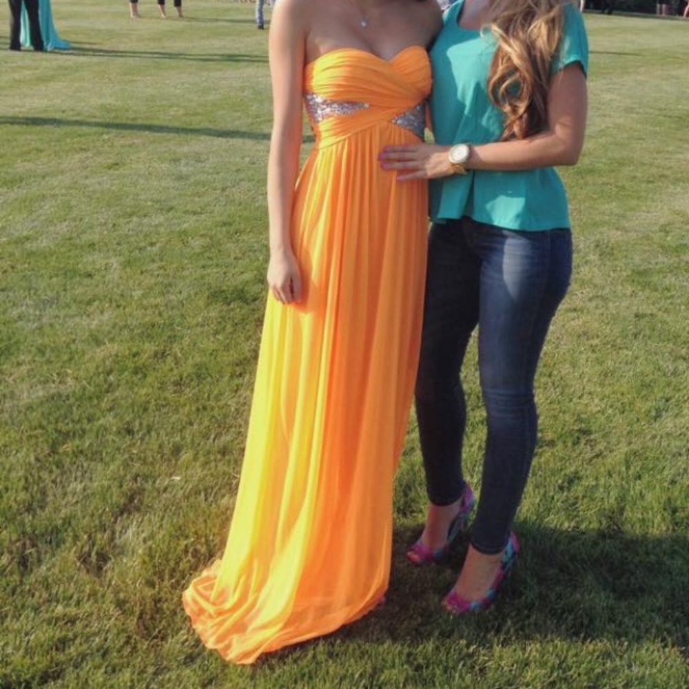 Orange strapless prom dress