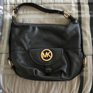 Black leather Michael Kors hobo bag