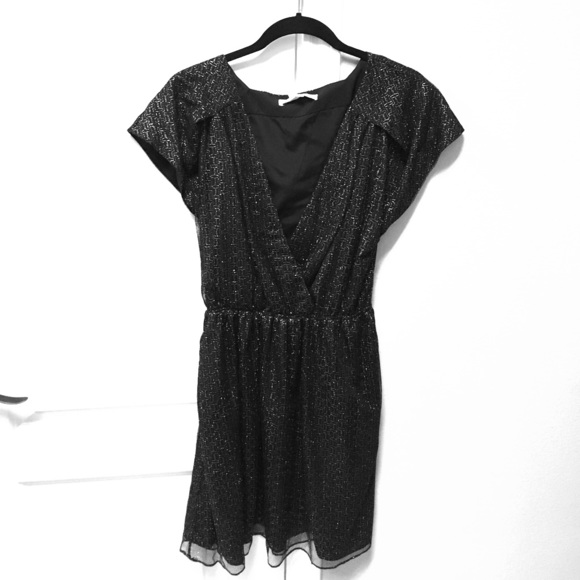 BCBGeneration Dresses & Skirts - Black&Silver mini dress low neck w/ peekaboo back!